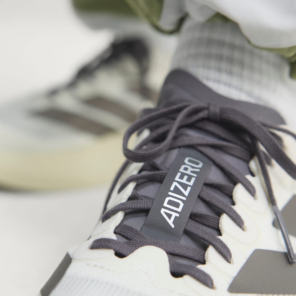Overkicks - Adidas Adizero Evo SL Off White Aurora Comet (KI9873) - vista superior