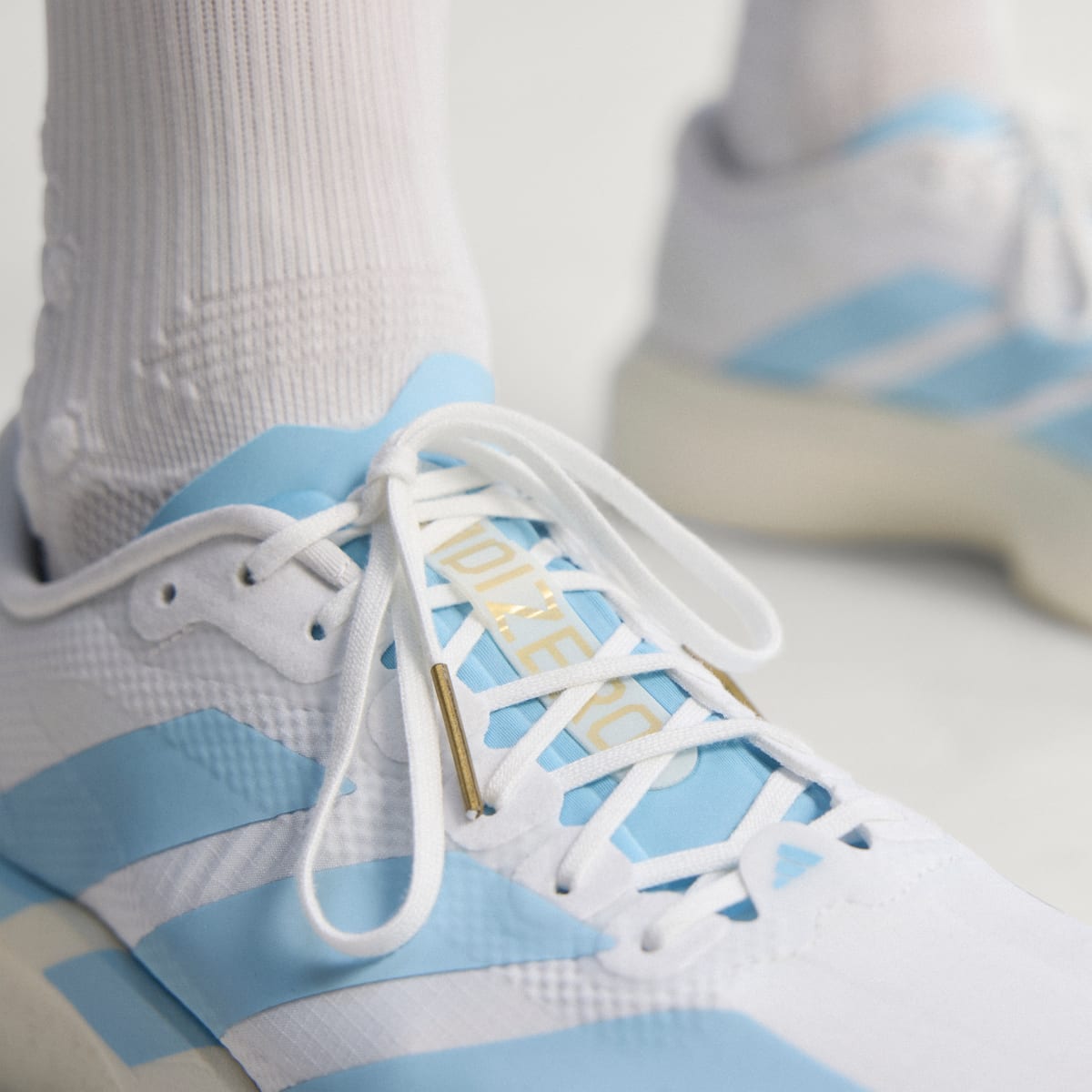 Overkicks - Adidas Adizero Evo SL White Clear Blue (JQ4527) - detalle talon