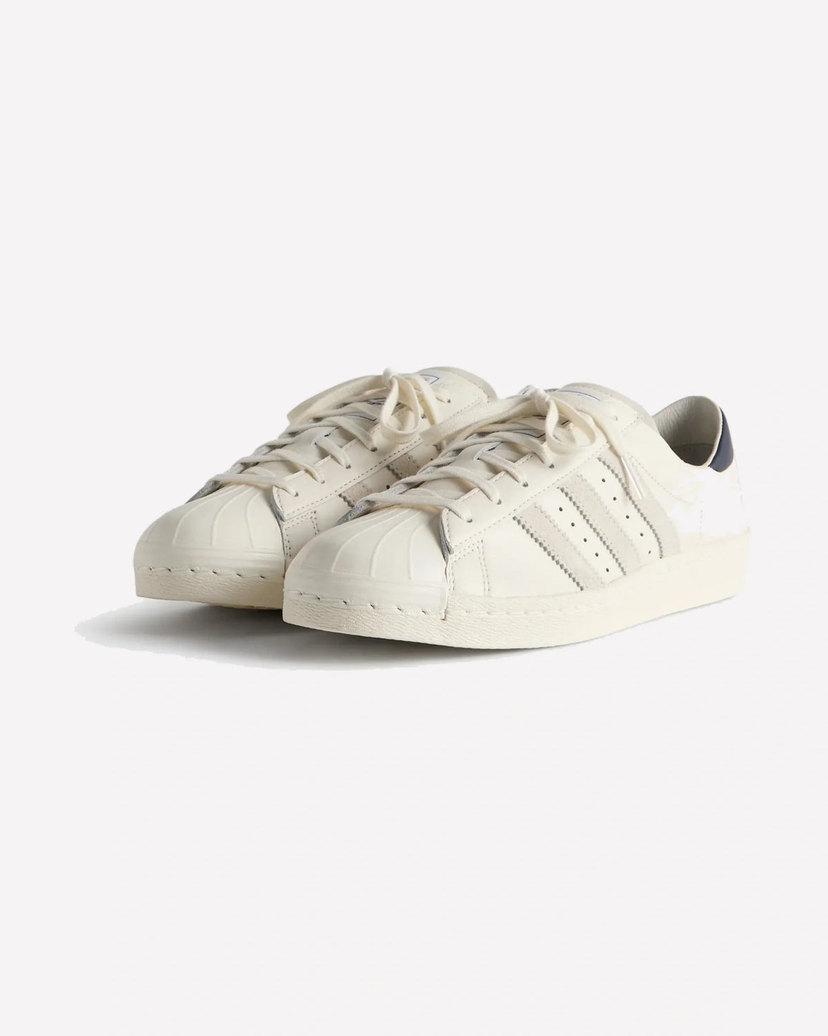 Overkicks - Adidas Superstar Kith x Lionel Messi Off White (KH6707) - vista lateral