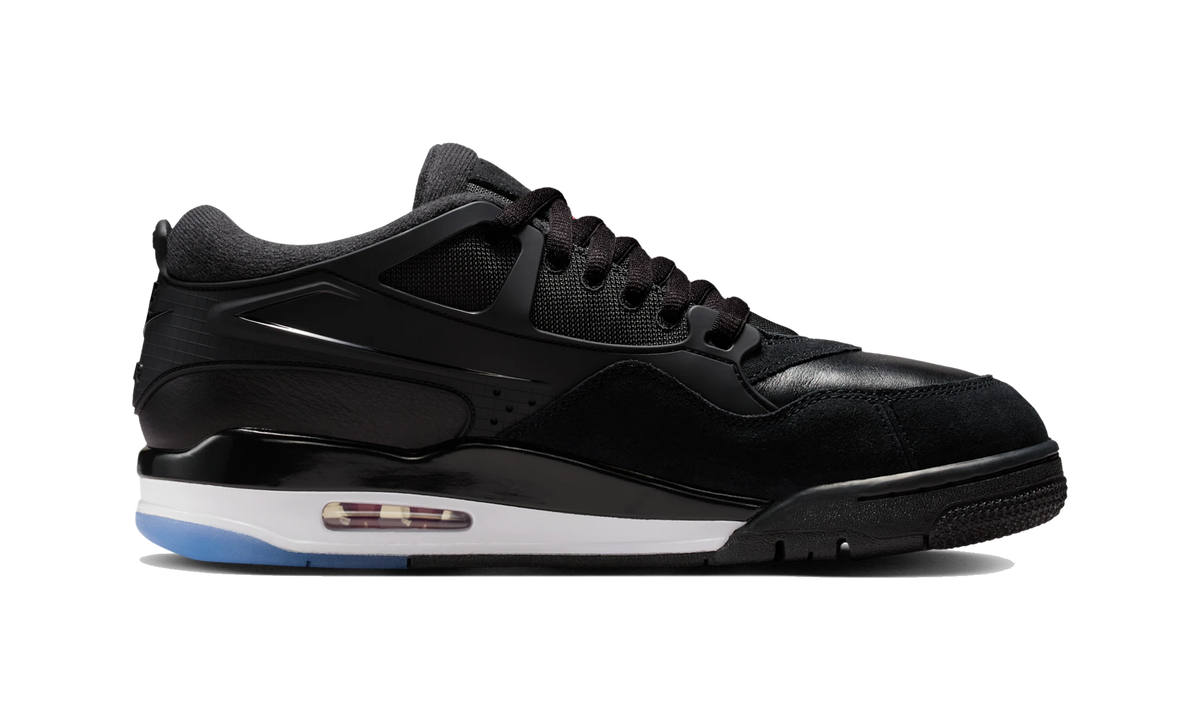 Overkicks - Air Jordan 4 RM Black White Varsity Red (FQ7939-009) - detalle suela