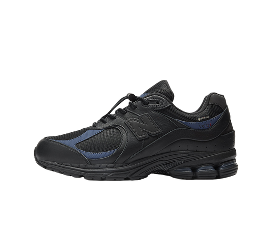 Overkicks - New Balance 2002R Gore-Tex JJJJound Black Storm (M2002RXW) - vista lateral