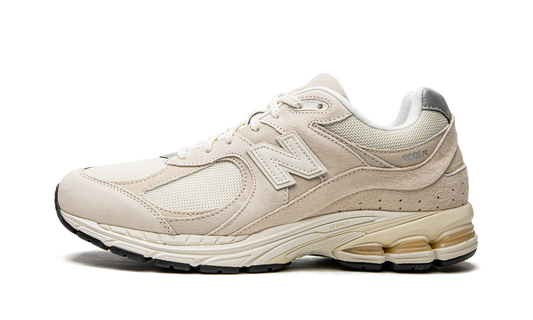Overkicks - New Balance 2002R Off White (M2002RCC) - vista lateral