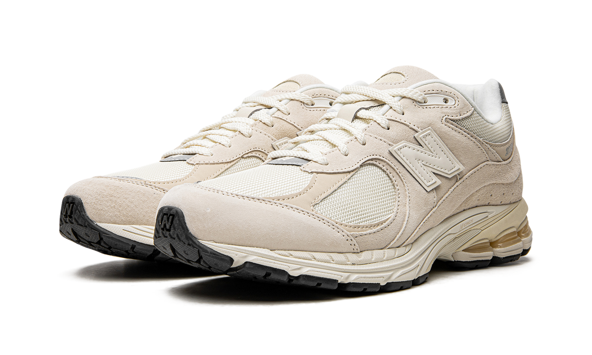 Overkicks - New Balance 2002R Off White (M2002RCC) - vista trasera