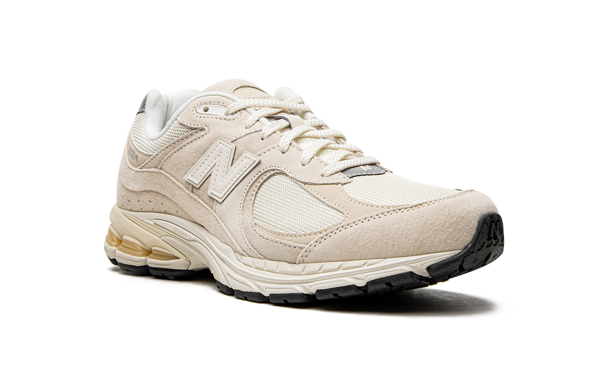 Overkicks - New Balance 2002R Off White (M2002RCC) - detalle lateral interior