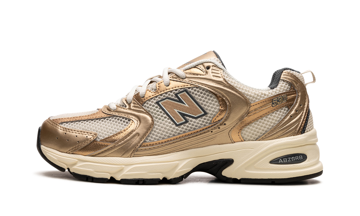 Overkicks - New Balance 530 Turtledove Gold Metallic (MR530LA) - vista lateral