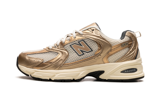 Overkicks - New Balance 530 Turtledove Gold Metallic (MR530LA) - vista lateral