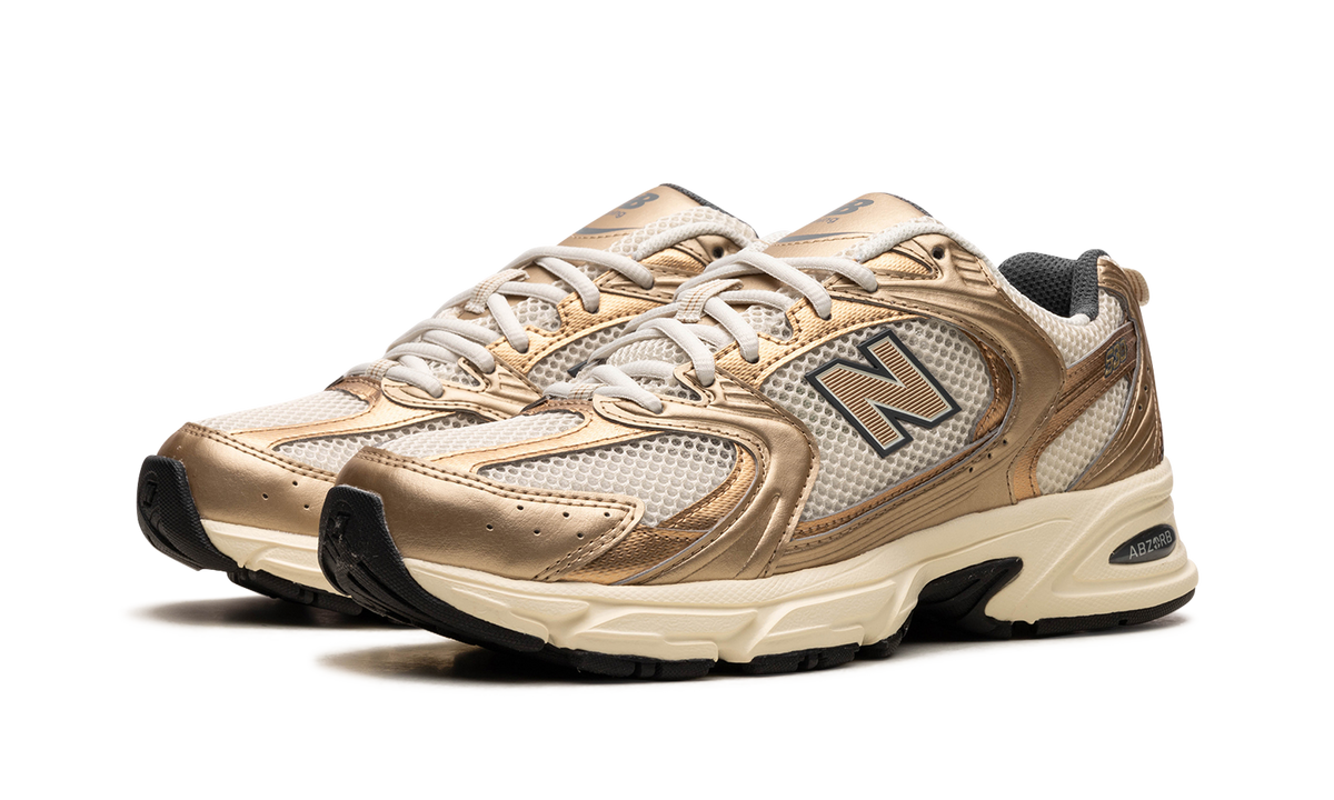 Overkicks - New Balance 530 Turtledove Gold Metallic (MR530LA) - vista trasera