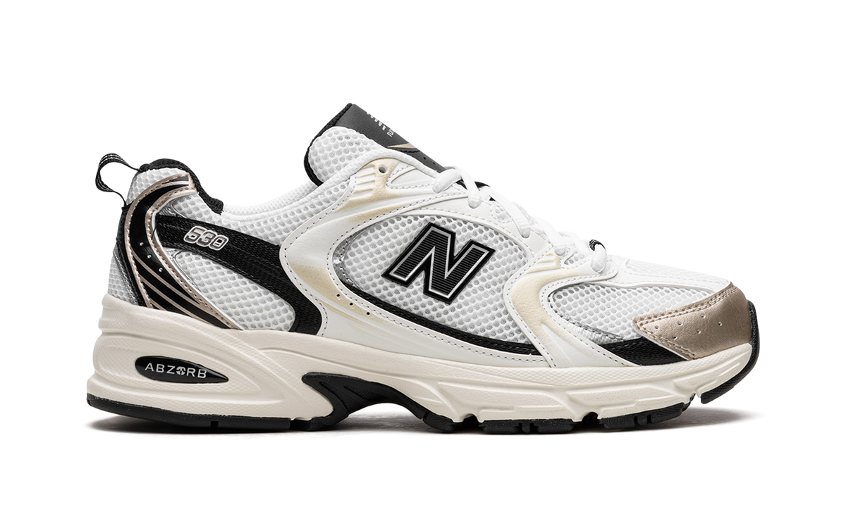 Overkicks - New Balance 530 White Light Gold Metallic (MR530TC) - detalle talón