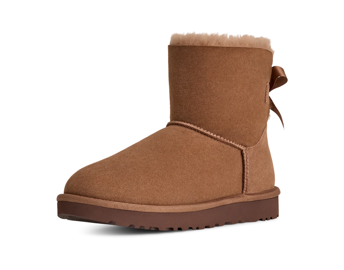 Overkicks - UGG Mini Bailey Bow II Rocky Oak (Womens) (1016501-RYK) - vista trasera
